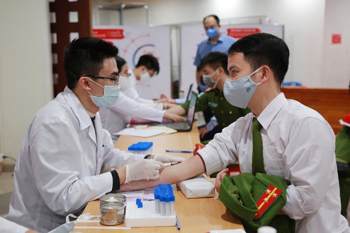 Blood being drawn for test samples by a mobile phlebotomist