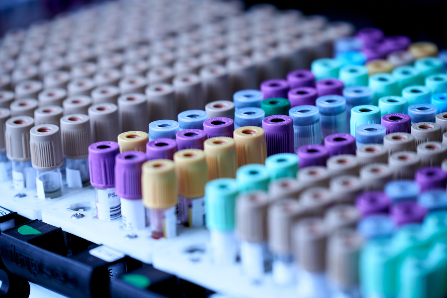 Several test tubes with colored lids