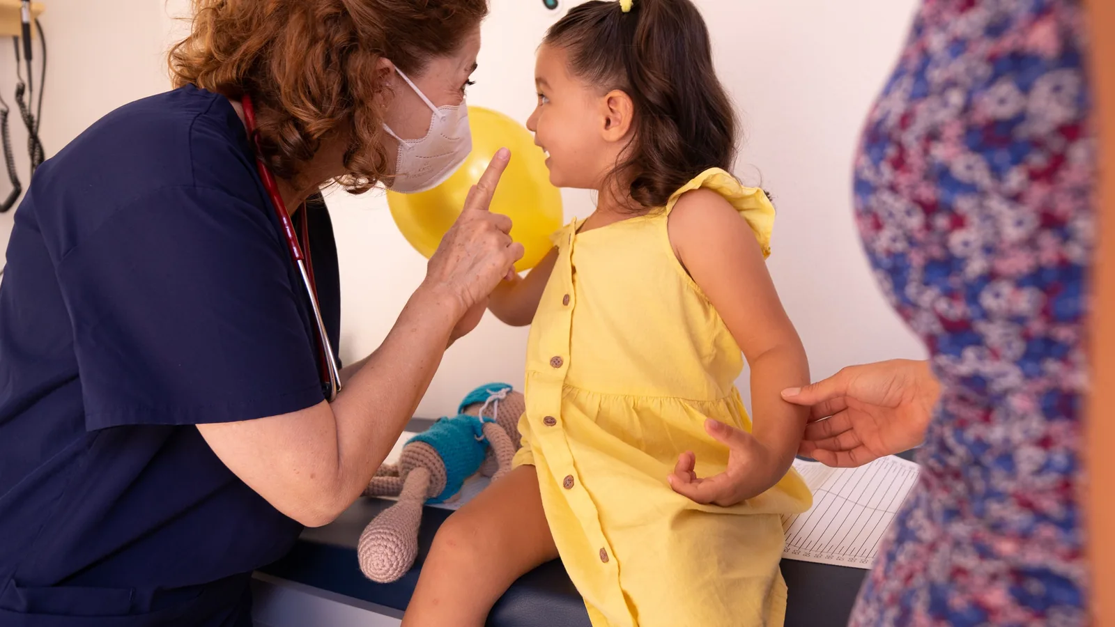 pediatric blood draw at home in Virginia, certified phlebotomist with a young patient